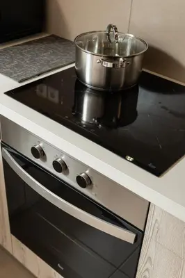 a pot sitting on top of a stove in a kitchen at Luxury Apartment in Halepa in Chania Town