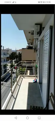 a balcony with a view of a building at central cozy and lovely house in Chania Town