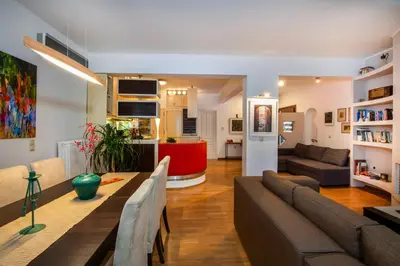 a living room with a couch and a table at Meraki Cretan Hospitality in Maleme