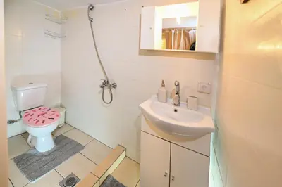 a bathroom with a sink and a toilet at Stone house for relaxation in Elos in Kissamos