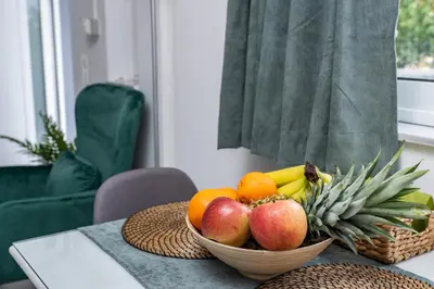 a bowl of fruit sitting on a table at ''Meraviglia'' casa ''Nefeli'' in Chania Town