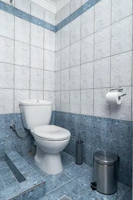 a bathroom with a toilet and a trash can at ''Meraviglia'' casa ''Nefeli'' in Chania Town