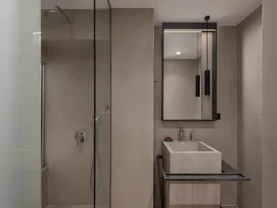 a bathroom with a sink and a shower at Casa Dorini in Chania Town