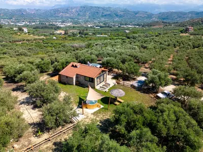 an aerial view of a house in a field at Villa Fabrica Baladakis adults only in Metókhi