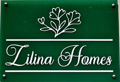 a green sign with the name oflime homes at Zilina Homes2 in Chania Town