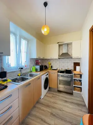 a kitchen with a sink and a dishwasher at Selini Seaview Villa in Kissamos