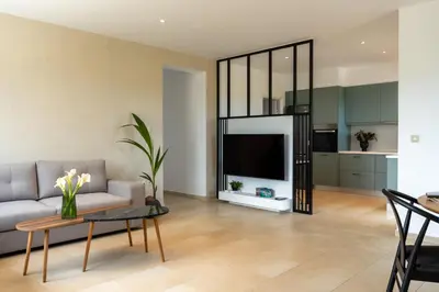 a living room with a couch and a table at Ros Solis Luxure House in Chania Town