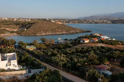 an aerial view of a town and a body of water at Villa Kiara in Tersanas