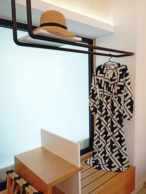 a room with a hat and a dress on a shelf at Domus Vivendi in Chania Town