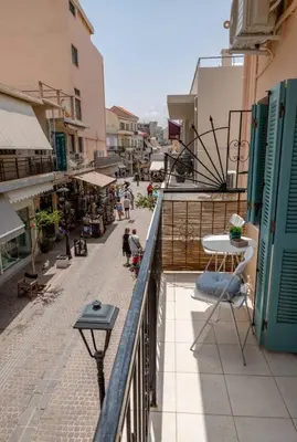 an apartment balcony with a view of a street at Four Seasons in Chania Town