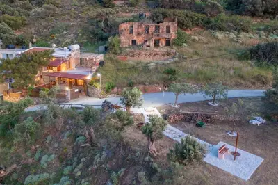 an aerial view of a house on a hill at PefkoPetro Loft in Chania Town