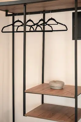 a shelf in a room with a bowl on it at Lavender suite sea view in Plataniás