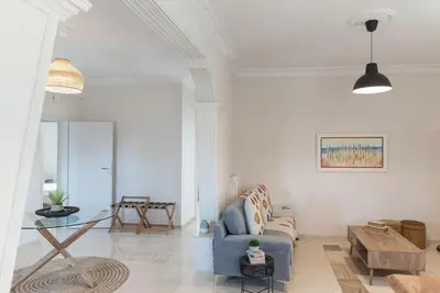 a living room with a couch and a coffee table at Katofli Slow Living in Pithárion
