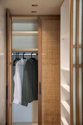 a walk in closet with a glass door at Nomas lifestyle living in Chania Town