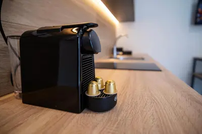 a container with five bullets sitting on a table at Sweven boutique apartments in Souda