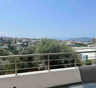 a balcony with a view of a city at Korina's Apartment in Daratso