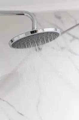 a shower with water coming out of it at Callista City Living in Chania Town