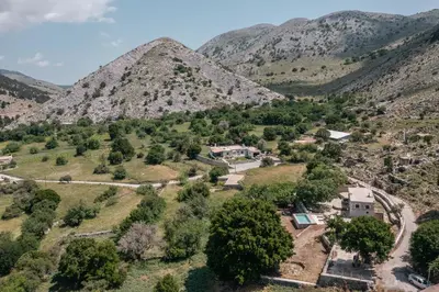 an aerial view of a village in the mountains at Nomas Home Imbros in Khóra Sfakíon