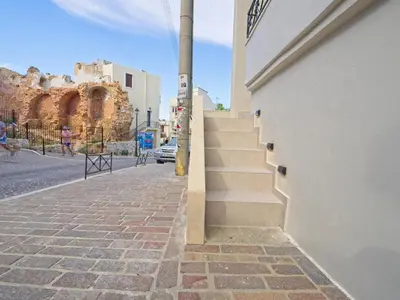 a stairway leading down a street next to a building at Il Porto Blu in Chania Town