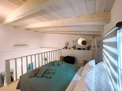 a bedroom with a bed in a room at Kerdos Home in Kalyves