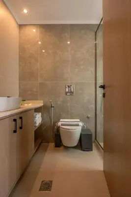 a bathroom with a tub and a sink and a shower at Eva's apartments in Kissamos