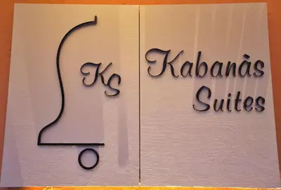 a sign for a quartet of hairdos and halberds at Kabanas suite 1 in Chania Town