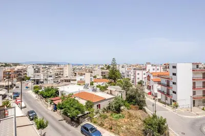 an aerial view of a city with buildings at Patelakis Apartment near the Beach in Chania Town