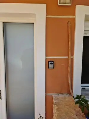 a door in a room with at Korais apartment, Chania Crete in Kounoupidhianá