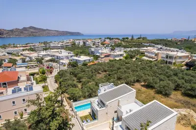 an aerial view of a city with houses at Megalith Villas in Agia Marina Nea Kydonias