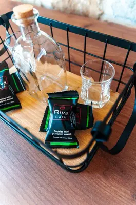 a table with a glass bottle and some bar soap at The Rock *Peaceful Retreat House in Kámbos