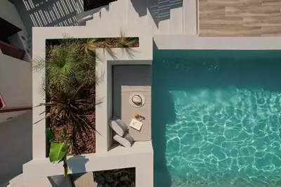 a rendering of a swimming pool in a building at Villa Methexis in Arménoi
