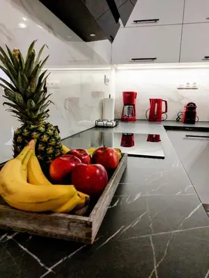 a tray of fruit on a counter in a kitchen at Blue Horizon Kissamos Apartment in Kissamos