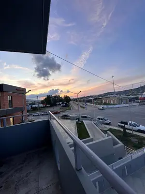 a view of a parking lot from a balcony at Nova Marine in Souda