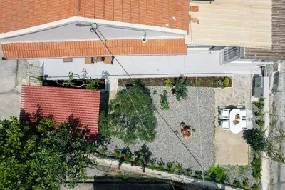 an overhead view of a backyard with a dog in a yard at Estia Comfort House in Chania Town
