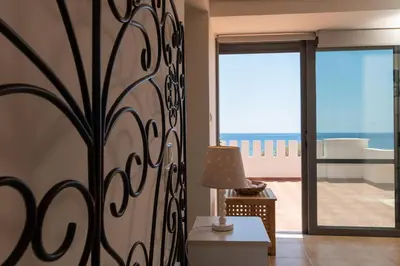 a living room with a view of the ocean at Marika Seaside Villa in Yialós