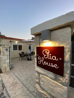 a sign for a pizza house on a patio at Elia House in Chania Town