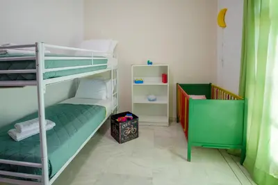 a room with two bunk beds in a room at Villa Thalia Chania in Chania Town