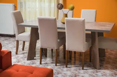 a dining room table with white chairs and a table and a table and chairsktop at Somine Apartment Chania in Chania Town