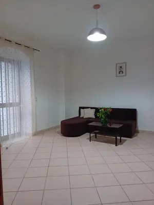 a living room with a couch and a table at Casa Artemis in Plátanos