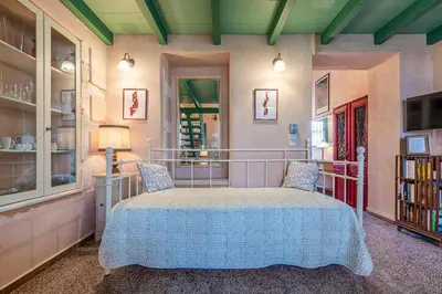 a bedroom with a bed in a room at Thimari Gardens in Chania Town