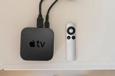 an apple computer and a wii controller hanging on a wall at AnnaBoutique Villa Next to Beach Private Pool & BBQ in Kato Daratso