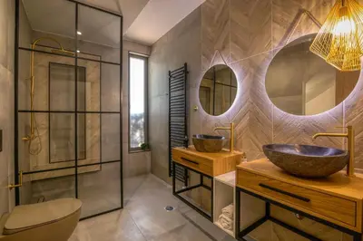 a bathroom with a sink and a mirror at Alyona Villas - Villa Lona in Skinés