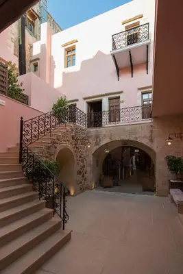 a building with a staircase and a building at Serenissima Boutique Hotel in Chania Town