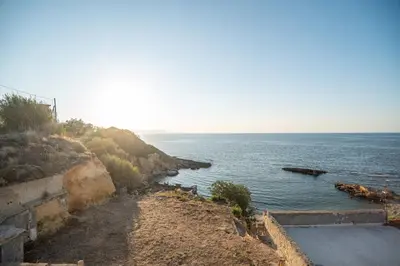 a view of the ocean from a cliff at Sea Gem family in Chania Town