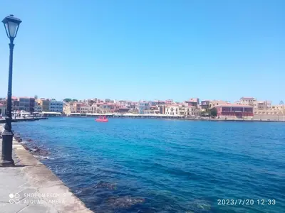 a body of water with a city in the background at Venetian Kamara in Old Town Chania in Chania Town