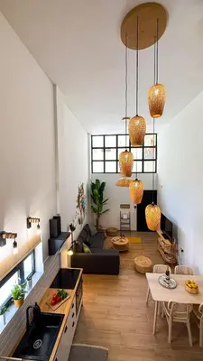 a living room with a couch and a table at Central City Loft by NEK in Chania Town