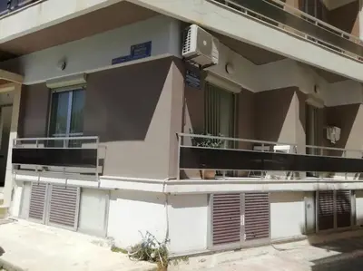 a building with balconies on the side of it at Enjoy Chania in Chania Town