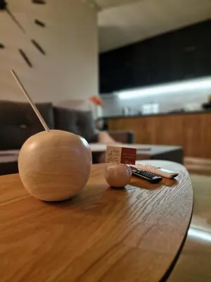 a wooden bowl sitting on top of a table at S n G/ Best view apartment in Kissamos