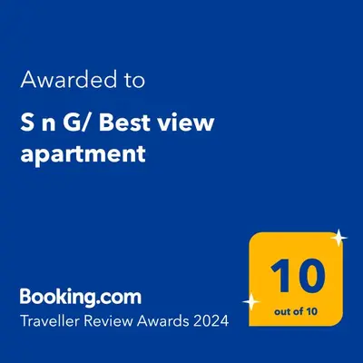 a yellow sign with the text awarded to s n g best view appointment at S n G/ Best view apartment in Kissamos