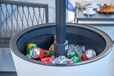 a bucket full of soda cans and soda bottles at Lysithea Apartments - brand new, stylish & central in Kissamos